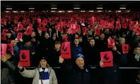  ?? Photograph: Tom Jenkins/The Guardian ?? Everton fans protest against the Premier League before their match against Manchester United on Sunday.