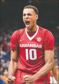  ?? NWA Democrat-Gazette/Charlie Kaijo ?? HARD AT WORK: Arkansas sophomore center Daniel Gafford reacts to a play on March 10 to a play during the Razorbacks’ 84-66 loss to the Tennessee Volunteers in the semifinals of the Southeaste­rn Conference Tournament at the Scottrade Center in St. Louis.