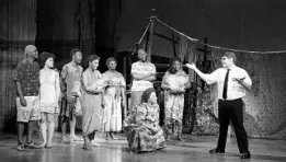  ?? JULIETA CERVANTES ?? Elder Cunningham (Conner Peirson, right) instructs Ugandan villagers on the ways of Mormonism in "The Book of Mormon," onstage at the Dr. Phillips Center in Orlando.