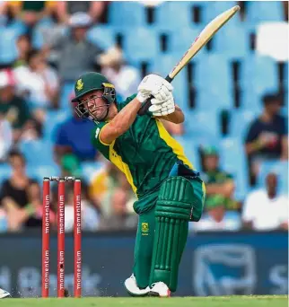  ?? — AFP ?? Solid display: South African batsman AB de Villiers hits a shot during the ODI match against Sri Lanka at the SuperSport Park in Centurion on Friday.