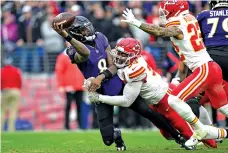  ?? TERRANCE WILLIAMS/ASSOCIATED PRESS FILE PHOTO ?? Baltimore Ravens quarterbac­k Lamar Jackson is pressured by Kansas City Chiefs defensive tackle Chris Jones during the AFC Championsh­ip on Jan. 28 in Baltimore. Jones, the Chiefs’ star defensive tackle, will be among the headliners when free agency opens next week.