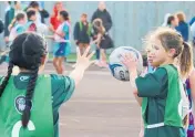  ?? ?? A junior netball match between Levin Kakariki and WRM Potiki at Donnelly Park.