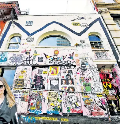  ?? ?? GRAFFITI GONE GLAM: Artist Jean-Michel Basquiat (inset) rented space from Andy Warhol at this Civil War-era building on Great Jones Street that now houses Angelina Jolie’s Atelier Jolie.
