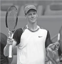  ?? GEOFF BURKE/USA TODAY SPORTS ?? Jannik Sinner salutes the crowd after his match against Tomas Machac on Wednesday at Hard Rock Stadium.