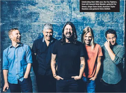  ??  ?? Celebratin­g their 20th year, the Foo Fighters, from left, bassist Nate Mendel, guitarist Pat Smear, singer Dave Grohl, drummer Taylor Hawkins and guitarist Chris Shiflett.