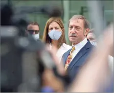  ?? Hearst Connecticu­t Media file photo ?? Attorney Jon Schoenhorn speaks to the media after representi­ng Michelle Troconis, left, at state Superior Court in Stamford on Aug. 28.