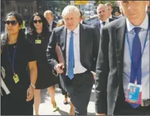  ?? The Associated Press ?? PRIME MINISTER: Britain's Prime Minister Boris Johnson walks down the street near United Nations headquarte­rs in New York, Monday.