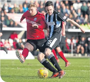  ??  ?? Brechin’s Euan Smith challenges the Buddies’ Liam Smith