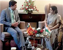  ??  ?? State Minister for Foreign Affairs Wasantha Senanayake paying a courtesy call in place of Ravi Karunanaya­ke, on Indian Foreign Minister Sushma Swaraj in Kathmandu Nepal.