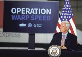  ?? JOE RONDONE/THE COMMERCIAL APPEAL ?? Vice President Mike Pence participat­es in a roundtable discussion about Operation Warp Speed at the Air National Guard 164th Airlift Wing on Dec. 3 in Memphis.