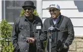  ?? MICHAEL GARD/POST-TRIBUNE ?? Tito Jackson, left, and his brother, Marlon Jackson, speak at the Jackson family home in Gary in 2021. The two, along with brother Jackie, have endorsed Eddie Melton in Gary’s mayoral primary.