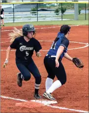  ?? TIM GODBEE / For the Calhoun Times ?? Calhoun’s Carlie Henderson (5) beats out a throw at first for a hit during Thursday’s game vs. Bremen.