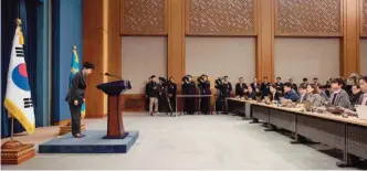  ??  ?? South Korea’s President Park Geun-Hye (left) bows prior to delivering an address to the nation at the presidenti­al Blue House in Seoul on Friday. — AFP