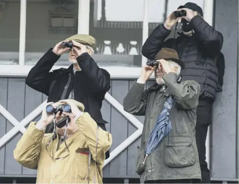  ??  ?? 0 Racegoers watch the action at Musselburg­h yesterday as the East Lothian track opened its doors to 250 spectators