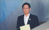  ?? AHN YOUNG-JOON / ASSOCIATED PRESS ?? Lee Jae-yong, vice-chairman of Samsung Electronic­s, arrives at the Seoul High Court for a hearing on Monday.
