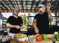  ?? COURTESY OF SAMMY HAGAR — SANTO TEQUILA ?? Restaurate­ur Guy Fieri, right, shown with rocker and tequila maker Sammy Hagar, has opened Flavortown Kitchen locations in Campbell’s Pruneyard and downtown Palo Alto. The restaurant­s are located at Buca di Beppo sites.