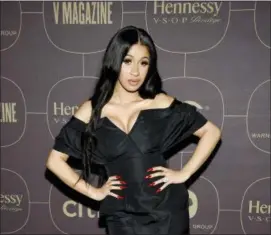  ?? PHOTO BY EVAN AGOSTINI — INVISION — AP ?? Rapper Cardi B attends the Warner Music Group pre-Grammy party at The Grill/The Pool on Thursday in New York.