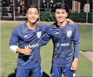  ??  ?? Anirudh Thapa (right) with Lallianzua­la Chhangte