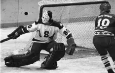  ?? Associated Press ?? Jim Craig deflects a puck shot by Soviet forward Helmut Balderis in the first period of the famous “Miracle on Ice” game.