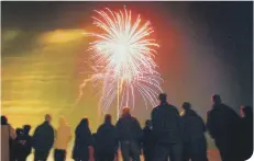  ??  ?? Crowds marvel at the fireworks display.