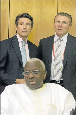  ?? Picture: REUTERS ?? EYE OF THE STORM: IAAF vice-president Sebastian Coe and IAAF senior vice-president Sergey Bubka stand behind the federation’s president, Lamine Diack. Coe and Bubka, both track and field world record holders, are in the running to succeed Diack.