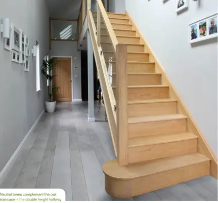  ??  ?? Neutral tones complement the oak staircase in the double height hallway