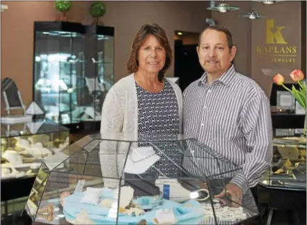  ?? PETER BANNAN — DIGITAL FIRST MEDIA ?? Lisa and Ivan Kaplan, owners of Kaplans Fine Jewelry on Market Street in West Chester. They are celebratin­g 40 years in business.