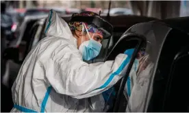  ?? Photograph: Alessandro Serranò/AGF/REX/Shuttersto­ck ?? A healthcare worker performs a Covid test at a testing centre in Rome. Europe has seen a surge in cases that have prompted warnings of health care systems being overwhelme­d.