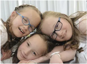  ??  ?? Triplets Hannah , Sophie and Isobel Rapple who made their First Holy Communion at St Marys Church