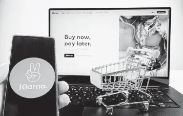  ?? Dreamstime / Tribune News Service ?? Designed to attract young shoppers, apps such as Klarna promise a safer, easier alternativ­e to credit with no interest and no surprise fees. But users don’t benefit from many protection­s applied to credit cards.