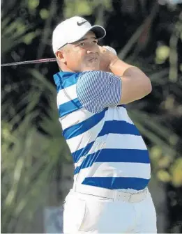  ?? MIKE EHRMANN/GETTY IMAGES ?? Jhonattan Vegas of Venezuela, shown here earlier in the tournament, had an ace on Sunday on the 15th hole. He used a 6-iron from 179 yards out and finished with a 64 on the day.