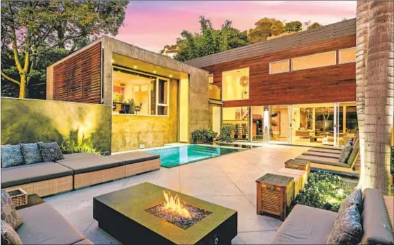  ?? Photograph­s by Anthony Barcelo ?? PREVIOUSLY OWNED by Meryl Streep, A-Rod’s Midcentury Modern home is defined by clean lines and open-plan living spaces.