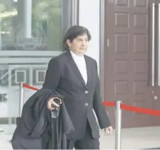  ?? — Malay Mail photo ?? Ambiga is pictured leaving the court.