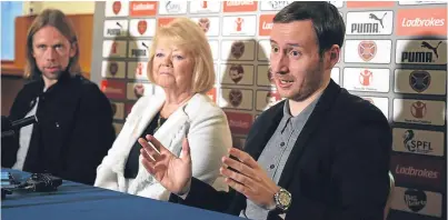  ?? Picture: PA. ?? New Hearts boss Ian Cathro, right, gave a confident display at his official unveiling alongside Gorgie owner Ann Budge and new assistant boss Austin MacPhee.