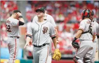  ?? Associated Press ?? San Francisco Giants’ starting pitcher Matt Cain walks off the field after being removed during the sixth inning of Sunday’s game against the St. Louis Cardinals in St. Loius.