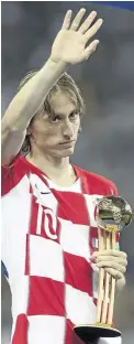  ?? / FRED LEE/GETTY IMAGES ?? Luka Modric of Croatia with the Fifa Golden Ball.
