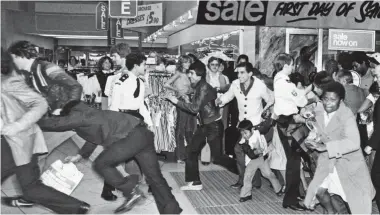  ??  ?? When Debenhams ruled the retail scene: Customers rushing for bargains at sale time