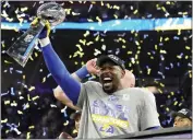  ?? KEITH BIRMINGHAM — STAFF PHOTOGRAPH­ER ?? Von Miller holds up the Lombardi trophy after helping the Rams defeat Cincinnati in Super Bowl LVI in February.