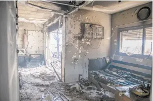  ?? ( Yossi Aloni/ Flash90) ?? A VIEW OF the damage caused to a house during a wildfire in Kfar Haoranim near Modi’in on Friday.