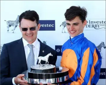  ??  ?? Aidan O’ Brien and his son, Donnacha, have cleaned up at the Curragh over the past two weekends.