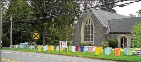  ??  ?? Wallingfor­d Presbyteri­an Church recently hosted the Memorials to the Lost T-shirt campaign organized by Heeding God’s Call. The object of the campaign is to bring attention to the issue of gun violence. Included on the T-shirts are the names and ages...