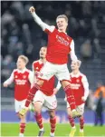  ?? ?? MAIN MAN: Arsenal’s Martin Odegaard celebrates after the Tottenham game.