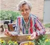  ?? Courtesy of Treemont ?? Treemont Independen­t Living resident Penny Johnson enjoys the “Gardening Angels” club.