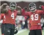  ?? ADRIAN WYLD/ THE CANADIAN PRESS ?? Will Micah Johnson, left, and Alex Singleton lead Calgary to a Grey Cup?