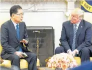  ?? SOUTH KOREAN PRESIDENTI­AL OFFICE VIA THE NEW YORK TIMES ?? Chung Eui-yong, South Korea’s national security adviser, meets with President Donald Trump in the Oval Office on Thursday. During the meeting, Trump threw aside caution and agreed to meet with North Korea’s Kim Jong Un in a daring and risky diplomatic...