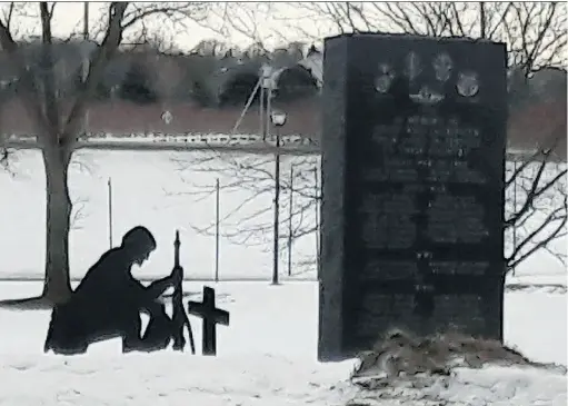  ?? FREEDOM FROM RELIGION FOUNDATION ?? The Freedom From Religion Foundation objected to the Belle Plaine Veterans Club’s memorial depicting a soldier in front of a cross, arguing that it was an endorsemen­t of Christiani­ty in violation of the establishm­ent clause of the First Amendment, and...