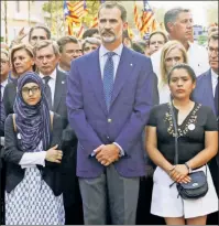  ??  ?? ROYAL TREATMENT: Spain’s King Felipe VI joins the brave citizenry on the march in Barcelona Saturday.