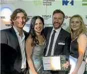  ?? ?? Neocrete’s Ethan Quirke, Zarina Bazoeva, Matt Kennedy-Good and Theresa Bischof with the runner-up climate action leader award at the Sustainabl­e Business Awards 2022.