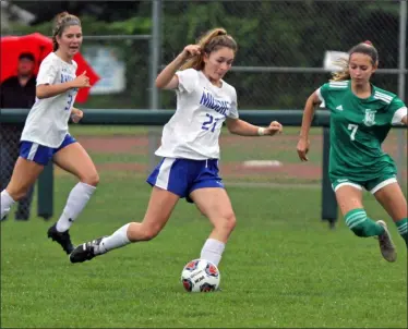  ?? RANDY MEYERS — FOR THE MORNING JOURNAL ?? Francesca Peters of Midview dribbles past Juliet Seng of Amherst during the first half Aug. 26.