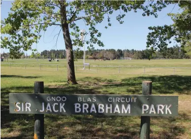  ??  ?? Windsock corner on the Gnoo Blas circuit, where Jack Brabham made his debut as a road racer. Below Part of the plaque commemorat­ing the almost forgotten track, opened after a disagreeme­nt with the nearby Mt Panorama circuit